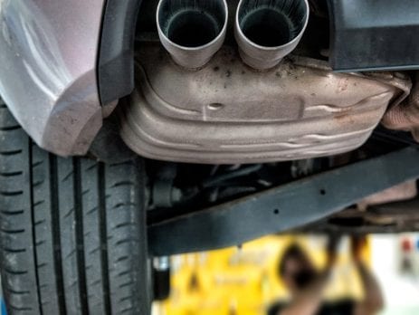 car on mechanics hoist