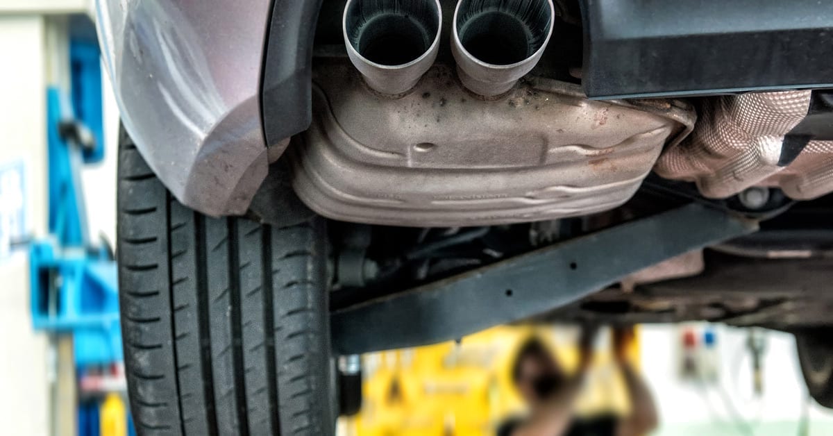 car on mechanics hoist